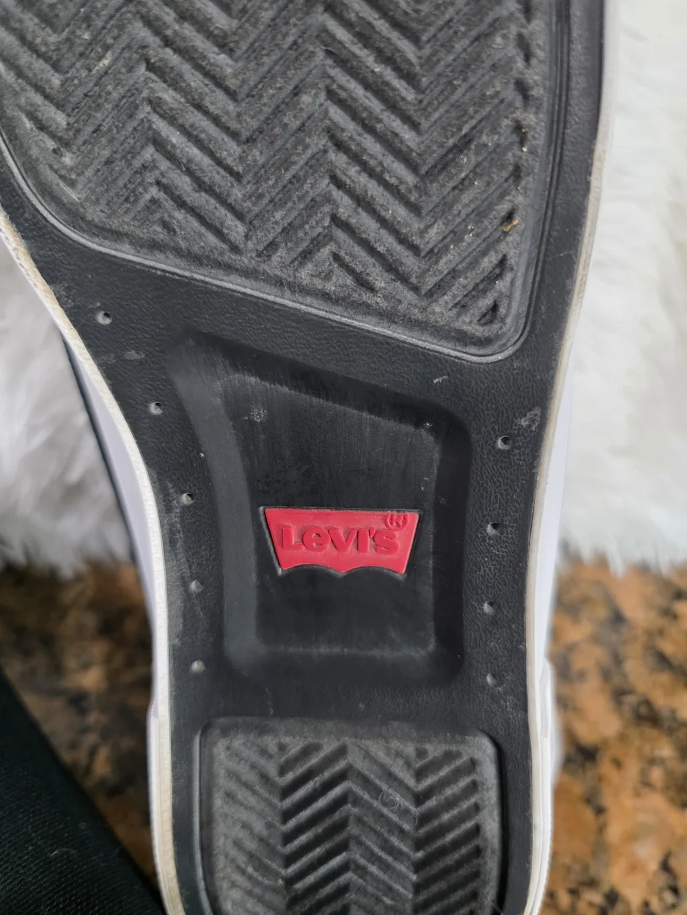 Levi's Men's Black Canvas Low-Top Sneakers with White Accents and Red Tab